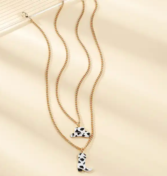 Gold chain cowprint necklace